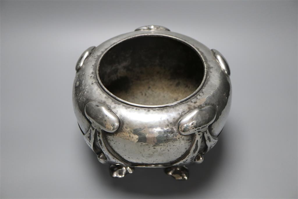 A Libertys Tudric pewter jardiniere, on five legs with spade feet, shape no. 01130, diameter 23cm
